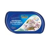 Heringshappen in Sahne-Sauce mit Zwiebeln und grünem Pfeffer